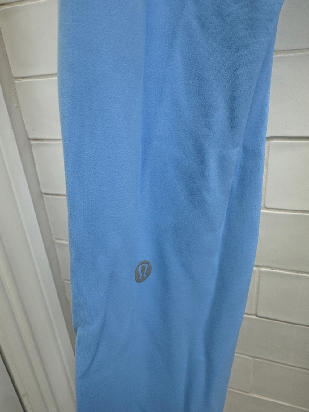 Lululemon Light Blue Leggings with Reflective Logo stain, see photos